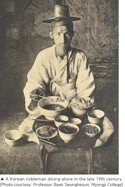 A Korean nobleman dining alone in the late 19th century.